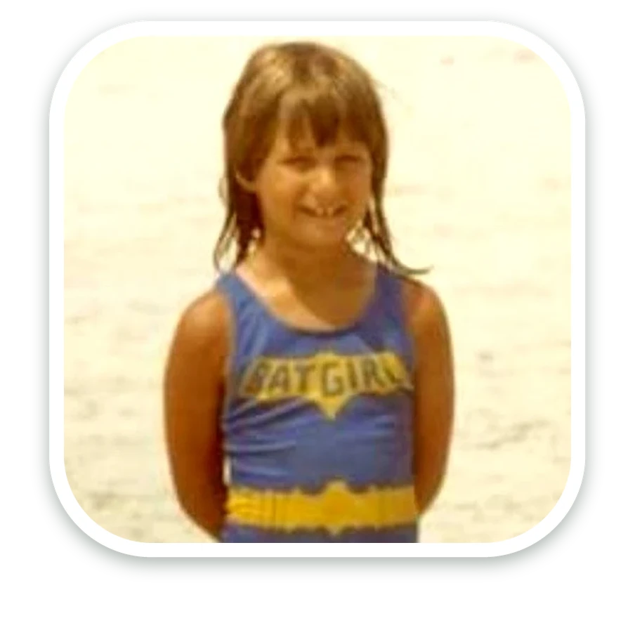 Lisa as a child in a superhero suit